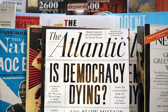 SAN FRANCISCO, CALIFORNIA - SEPTEMBER 16, 2018: A rack of magazines, including The Atlantic, on display in a bookstore in San Francisco, California. The Atlantic cover story promo asks 'Is Democracy Dying?' In 2017, billionaire investor and philanthropist Laurene Powell Jobs, widow of Steve Jobs, acquired majority ownership of the magazine. (Photo by Robert Alexander/Getty Images)