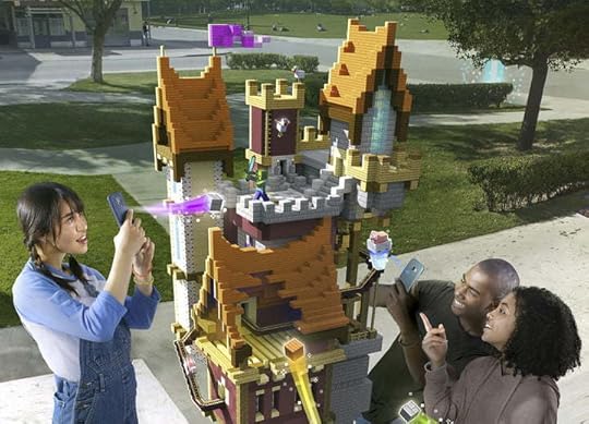 Players building a castle structure together in a park| Minecraft Earth Key Art