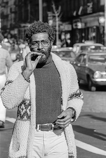 Black-and-white photograph of a man smoking