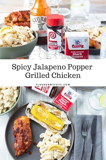 A black plate with Spicy Jalapeno Popper Grilled Chicken breast, grilled corn on the con and Pickled Tomato Pasta Salad