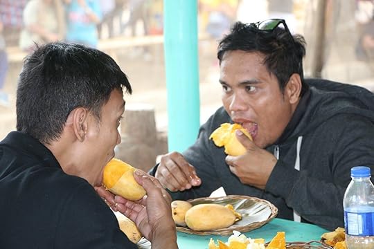 People eating mangoes at Guimaras Manggahan Festival