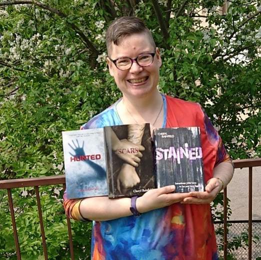 My friend and neighbour Denyse took some creative photos of me and my books today. I have so many that I think I’ll post some over the next few days. It was fun, and I really liked how they turned out!<br /><br />#cherylrainfield #YAwriter #LGBTQwriter #booknerd #bookworm #ireadYA #survivor #feminist #YAlit #YAbooks #bookstagram #bookrecs #bookrecommendations #booklove #booknerd #yaauthors<br />#authorsofinstagram #yaauthorsofinstagram #YAbooksmentalhealth