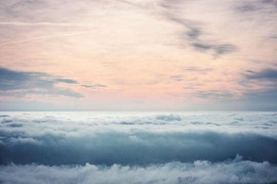 Pink and blue horizon with gray clouds