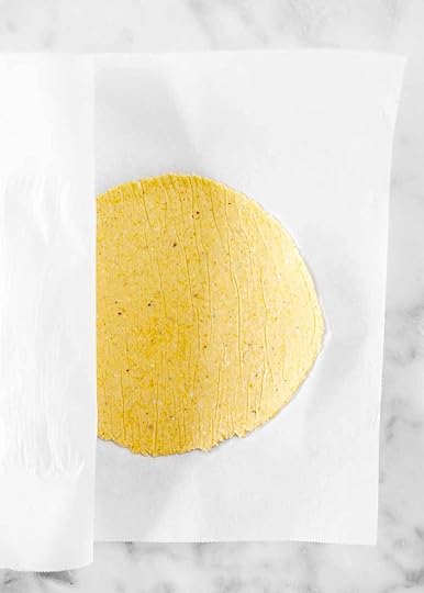 corn tortilla in parchment paper