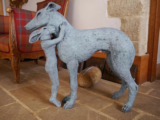Girl Hugging Dog by Sophie Ryder