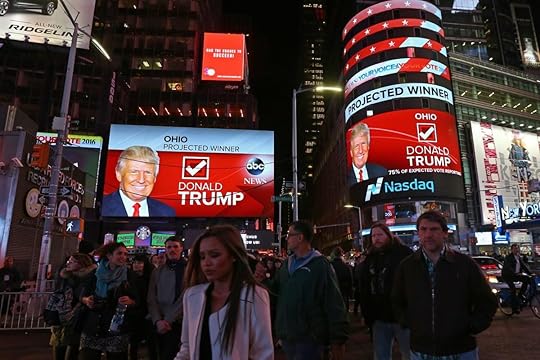 NEW YORK, UNITED STATES: People follow results of the 2016 Presidential Elections at Time Square Center in New York, United States on November 9, 2016. [Volkan Furuncu/Anadolu Agency]