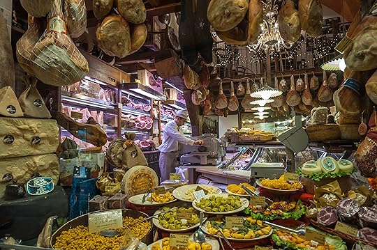 Window of typical grocery shop in Bologna