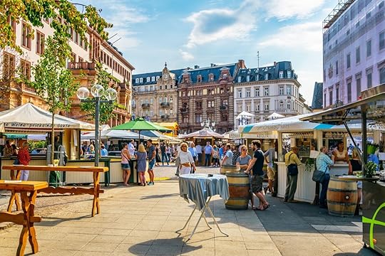 Tourists are strolling on marktplatz in the center of Wiesbaden, Germany