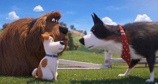 Duke (left, voiced by Eric Stonestreet) and Max (Patton Oswalt) have a lot to learn from no-nonsense farm dog Rooster (Harrison Ford) in 