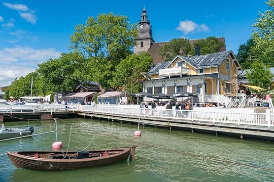 The small boat harbour and Naantali church at sunny summer day