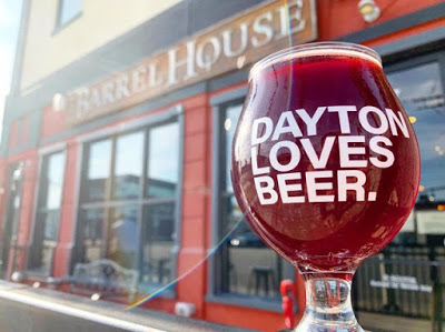 Photo of beer goblet etched with "I love Dayton" in front of Barrel House.