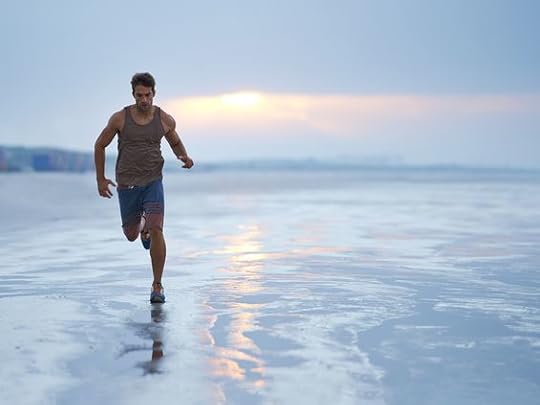 Man Running on the Beach