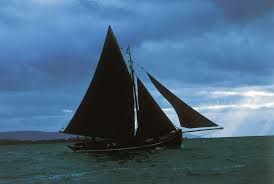 sail boat with black sails