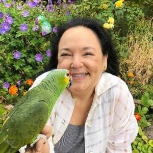 Barbara with her parrot, Harry.