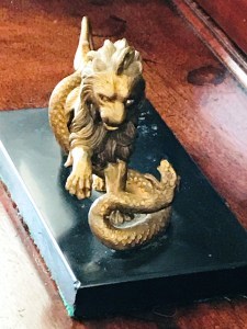 Lions in Charleston, statuary depicting the king of the jungle, Lion decorations, door knockers, Charleston gardens, heraldry in the colonies