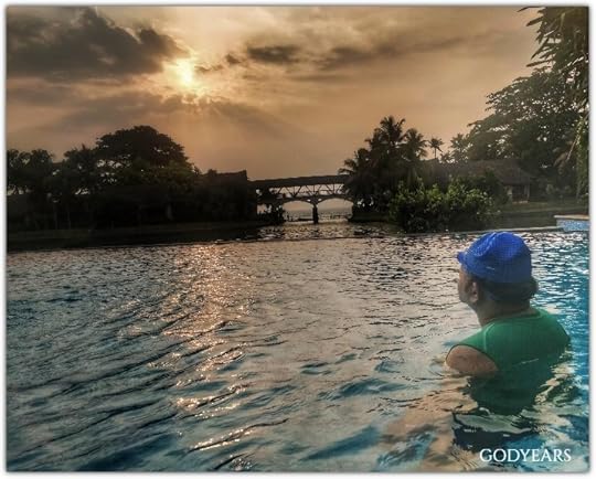 sunset by the pool