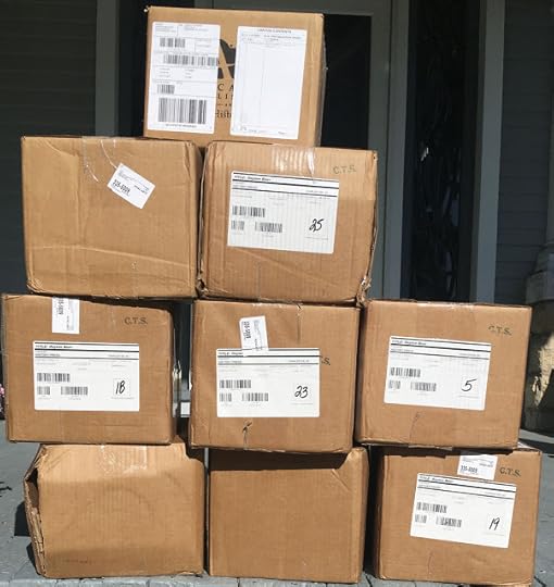 Photo showing a stack of nine boxes containing 300 copies of Dayton Beer.