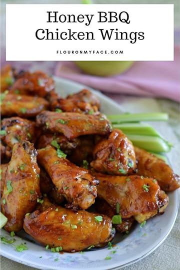 a serving platter full of Honey BBQ Chicken Wings to serve as a party appetizer or for games day.