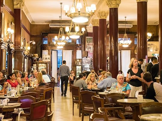 People in cafe Tortoni on Avenida de Mayo in city centre Microcentro in Monserrat district in capital Buenos Aires, Argentina