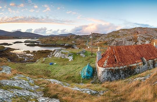 Sunset over an abandoned croft at Quidnish on the Golden Road on the Isle of Harris in the Western Isles of Scotland
