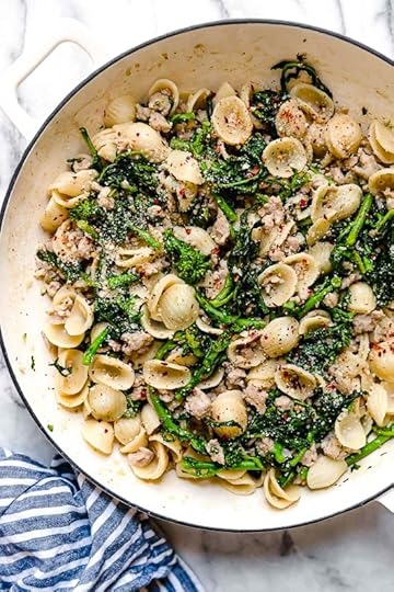 Orecchiette Pasta with Sausage and Broccoli Rabe uses chicken sausage in place of pork and a whole lot of garlic! This lightened up version will not disappoint!!