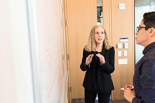 woman coach explaining to man