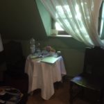 table in chair in old room