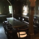 old hall with table and chairs