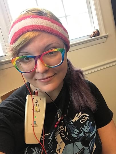 Selfie-ing it up with the Fisher Wallace Stimulator. I tend to use a sweatband with it instead of the included Velcro headband; it just has always worked way better for me.