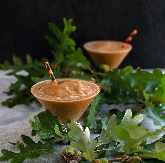 Frozen pumpkin spice coffee in pumpkin stemmed martini glass
