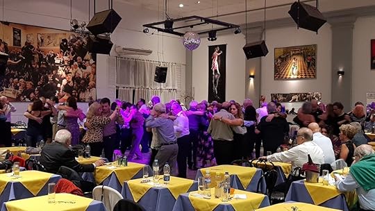 People tango dancing