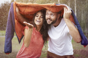 Couple enjoying the rain.