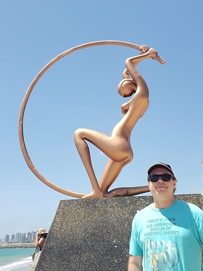 Image may contain: 1 person, standing, sky and outdoor