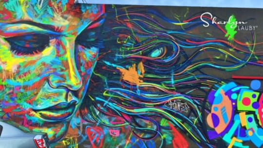 wall art surreal female face representing HR technology