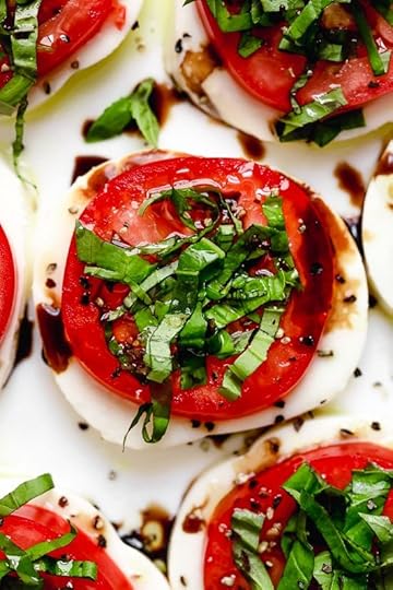 Caprese Salad or Insalata Caprese is a simple salad of fresh mozzarella and tomatoes topped with basil and a splash of balsamic. A perfect end of summer appetizer or side dish, especially when tomatoes are at their peak.