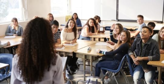 Teacher in front of classroom of students