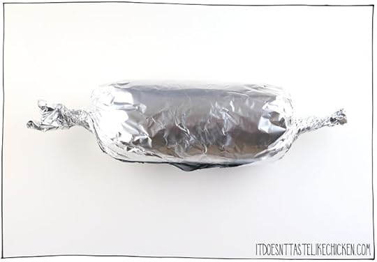 Roll up the vegan bologna in foil like a large candy, or you can alternatively wrap the baloney in parchment paper and then cheesecloth tying the ends closed.