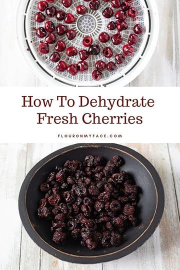 a bowl of cherries dried in a dehydrator in a black wooden bowl.
