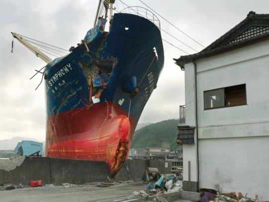 Damaged ship and house after earthquake and tsunami in Tohoku, Japan, part of the Datazone exhibit at the Rencontres d'Arles, using Chancel photographs and crossing cultures to deliver a message via documentary photography. (Image © Philippe Chancel. Courtesy of the artist and the Melanie Rio Fluency Gallery.)
