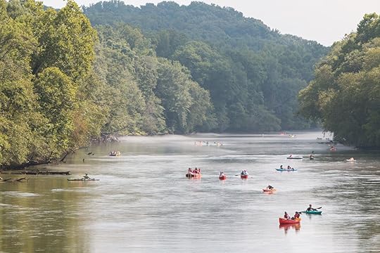 People rafting and kayaking down Chattahoochee River