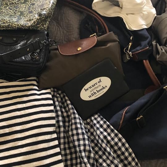 Then you pile everything you might want to take in a big heap on your bed.