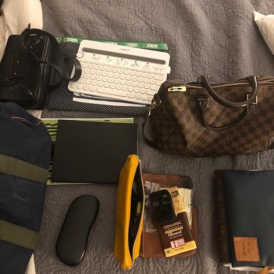 Now you start your next pile of essential items. Yes, a chocolate bar is always an essential for travel.