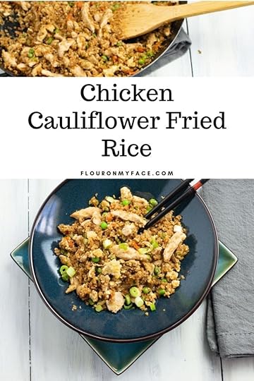 featured image of a black glass bowl filled with Chicken Cauliflower Fried Rice with a set of chop sticks in the bowl.