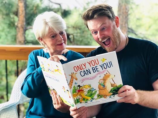 We always did enjoy reading books together…..:) Nathan, 30, and me reading our new book together. :)