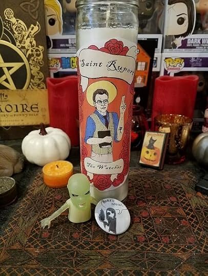 The prize: Giles candle, Grr Argh monster, evil Willow. The rest of this picture is just my Halloween shrine.