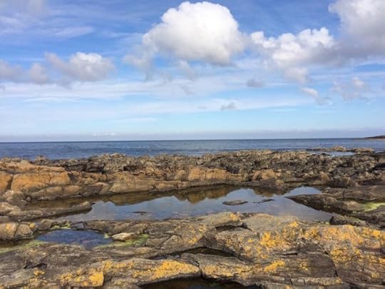 rocky shores and clouds