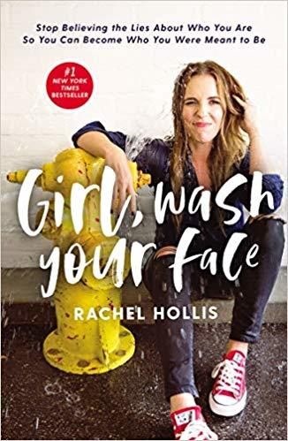 Cover image of blonde-haired woman sitting on the floor by a spewing yellow fire hydrant