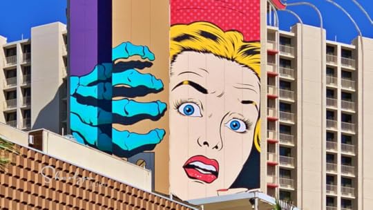 wall art graffiti frightened woman next to skeleton hand showing stress and burnout