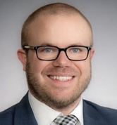 Alexander Dunn Foley Lardner Law Office headshot