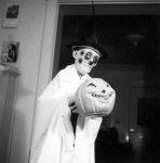 Another masked figure